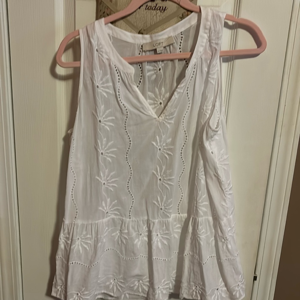 Beautiful white cut out tank.